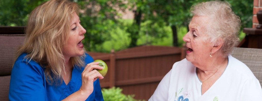 women engaged in conversation