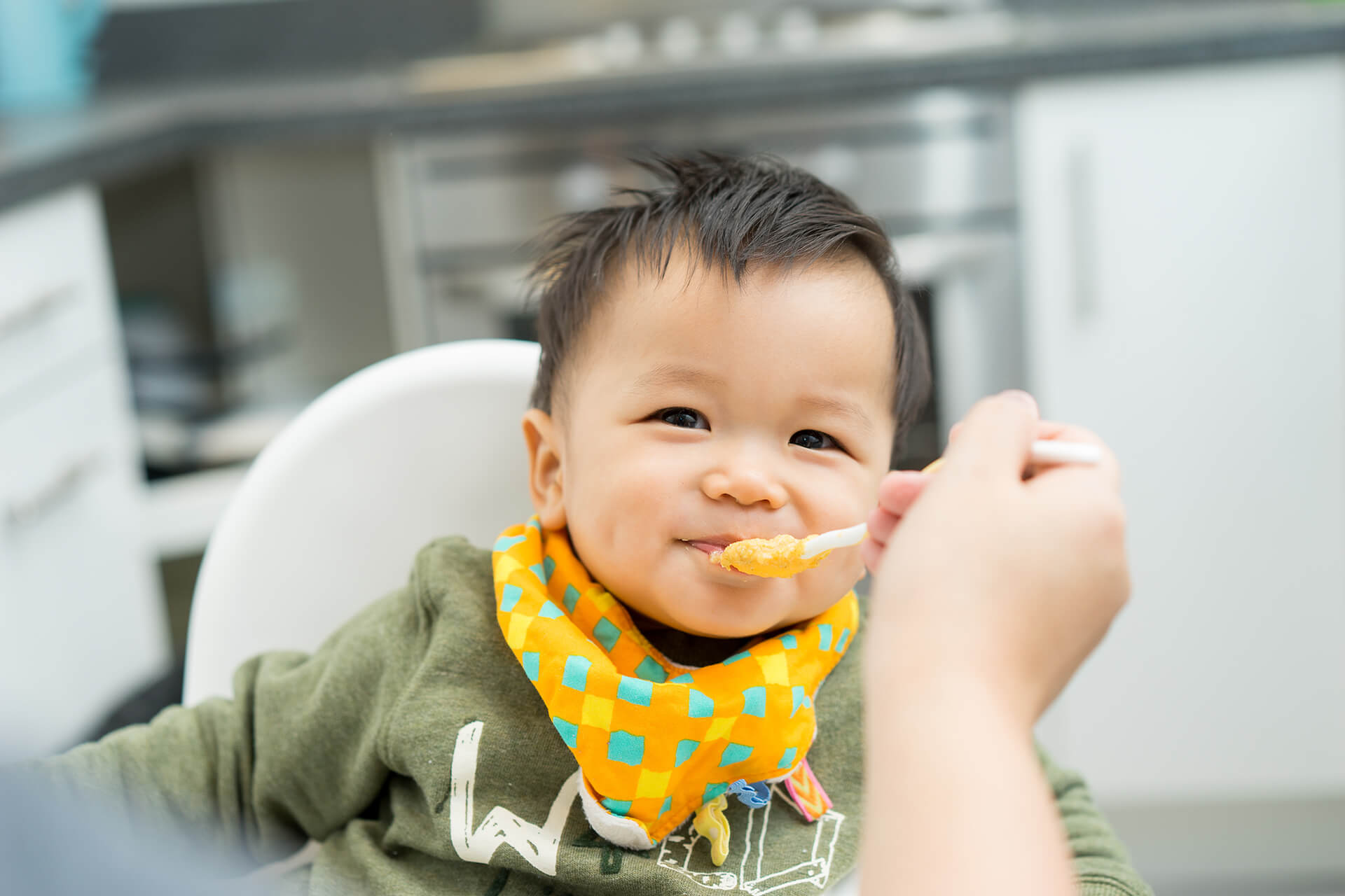 baby being spoon fed